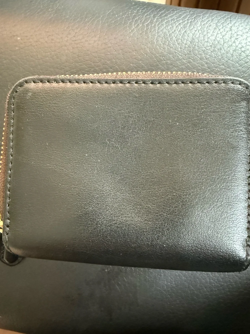 Coach Small Trifold Wallet crafted in Signature coated canvas